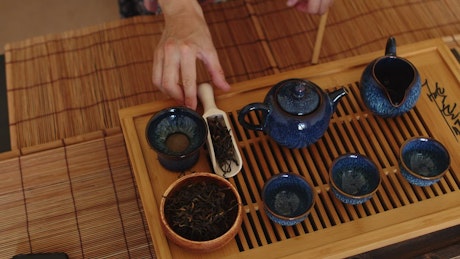Traditional Japanese tea set being prepared.