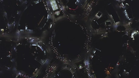 Traffic at a roundabout at night