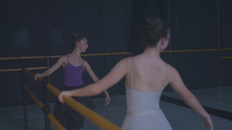 Two experienced ballet dancers practicing