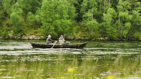 Two men fishing.