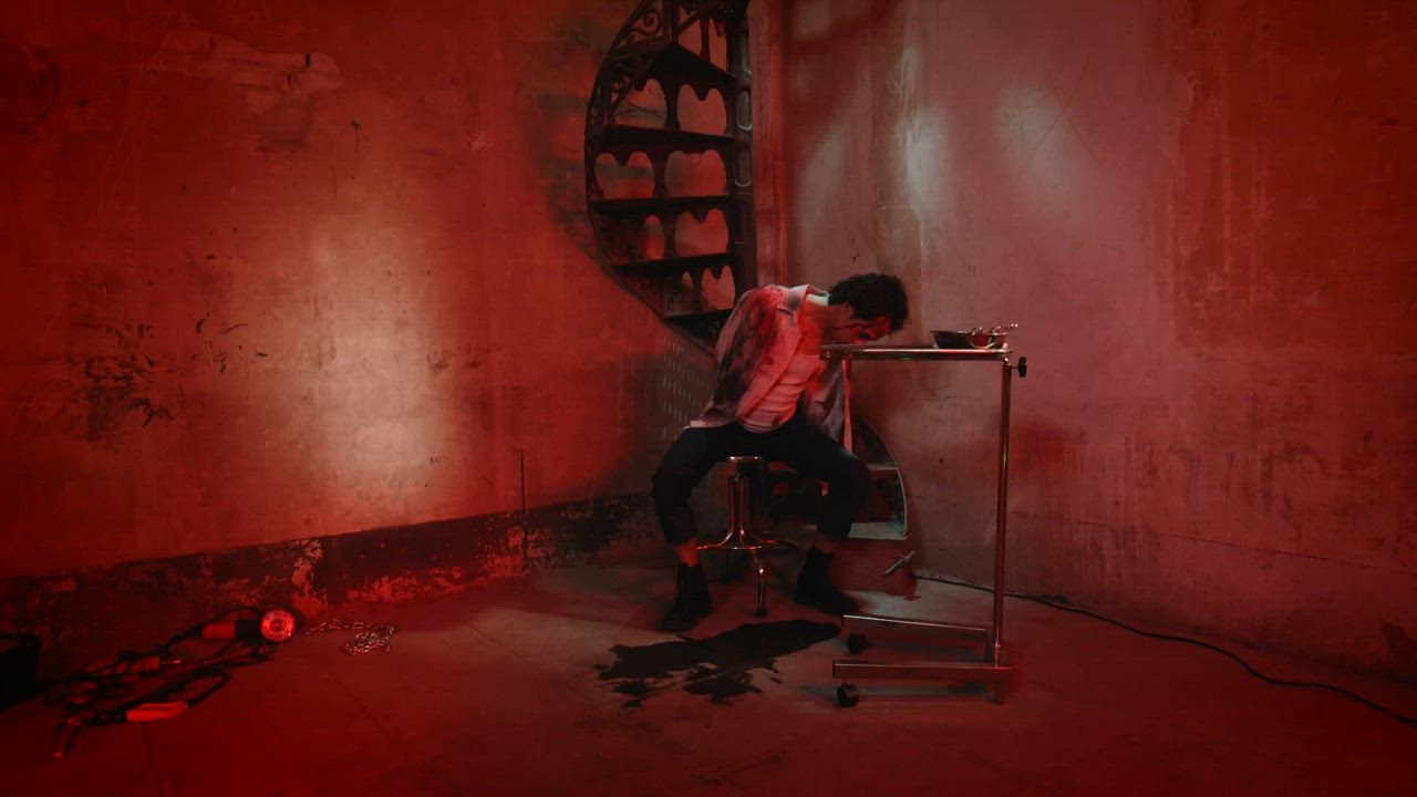 Unconscious victim in a dark torture chamber - Free Stock Video