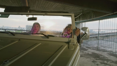 Urban style women in a car.