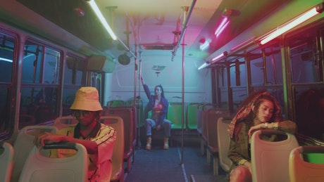 Urban trendy models on a bus.