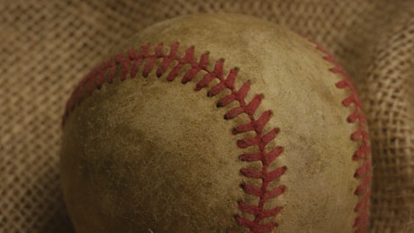 Vintage and used baseball ball close up