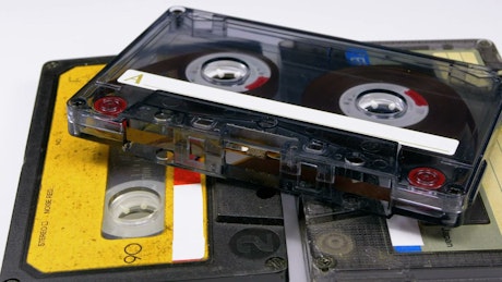 Vintage audio cassettes spinning.