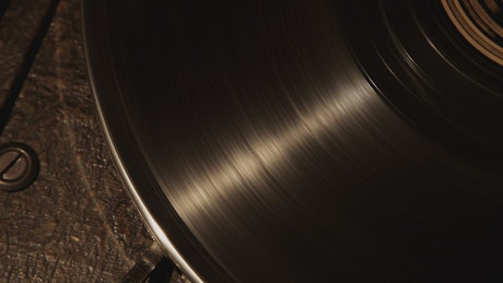 Vinyl record playing on a turntable.