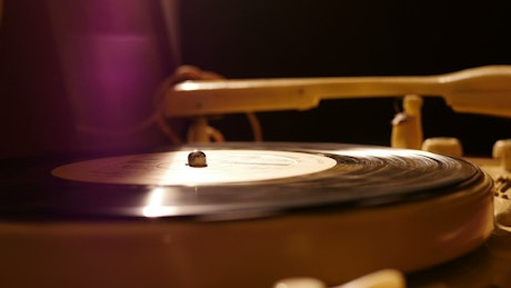 Vinyl turntable spinning.