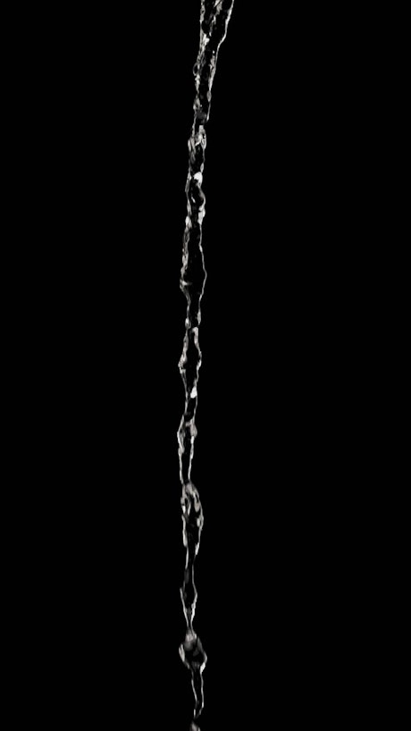 Water falling on a dark background.