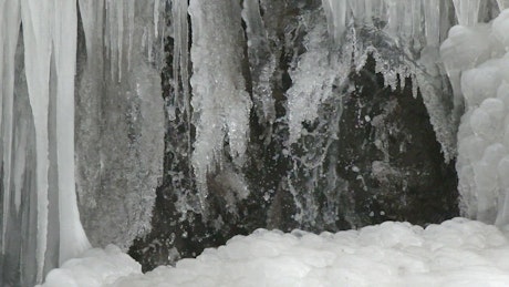 waterfall in a frozen landscape.