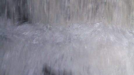 Waterfall splashing on a ledge