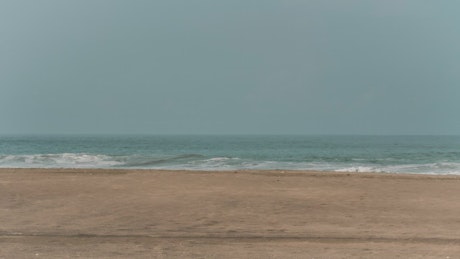 Waves at an empty beach