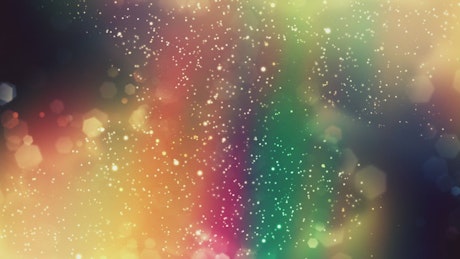 White particles moving on multicolor background.