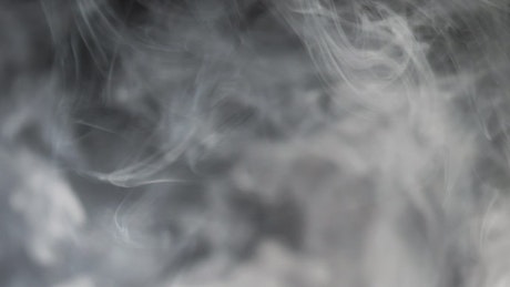 White smoke with black background