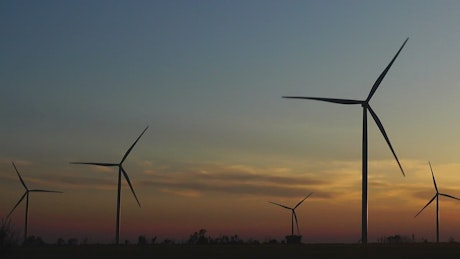 Wind turbines at sunset.