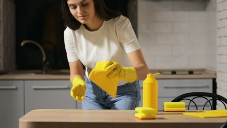 Woman cleaning her house in detail.