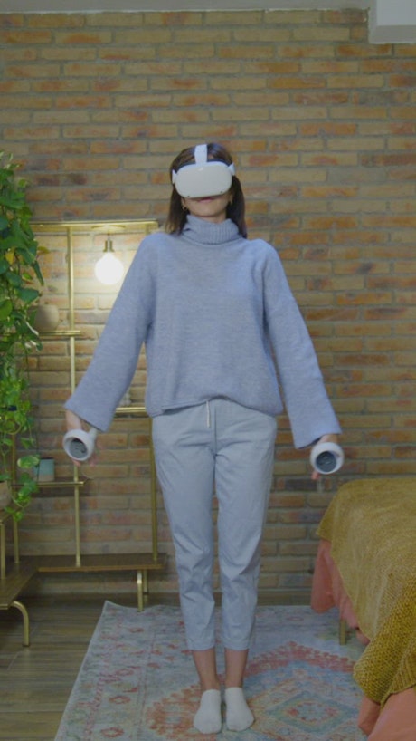 Woman doing yoga with virtual reality.