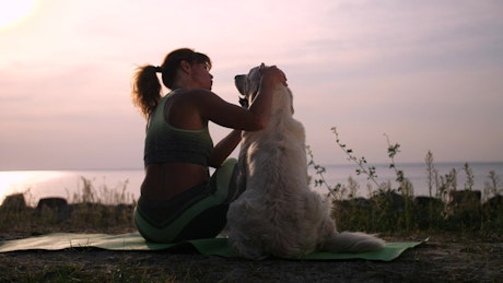 Woman relaxing with her dog.