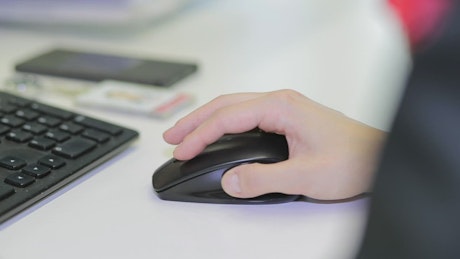Woman using a wireless mouse