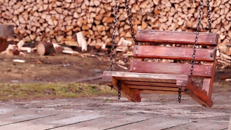 Wooden swing on chains
