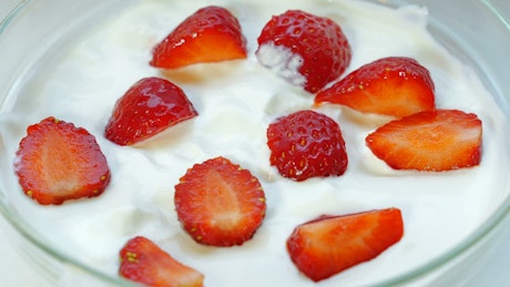 Yoghurt snack with fresh strawberries.