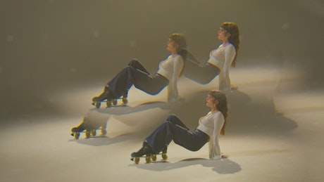 Young woman dancing on roller blades.