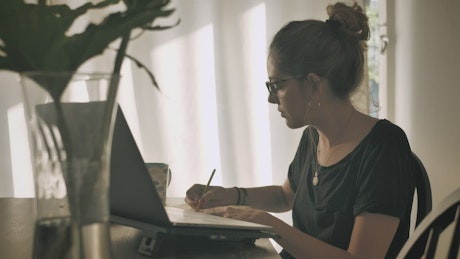 Young woman working remotely