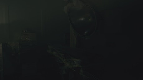 Zombie male nurse alone in the dark.